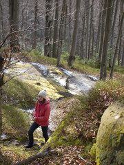 Fototapeta premium Girl walking in the forest.