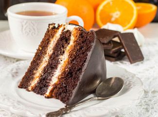 Delicious chocolate cake with cream and fruit