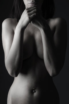 Naked model in a studio