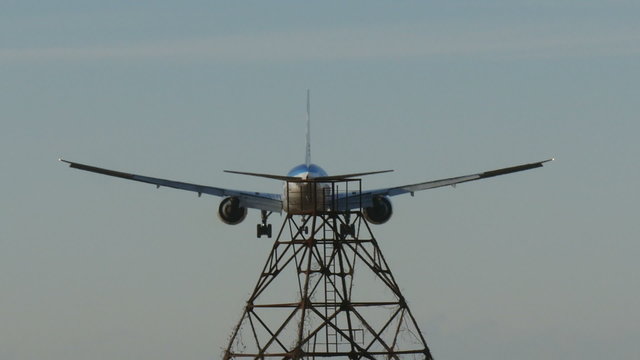 Closeup of landing airplanes at Narita Airport
