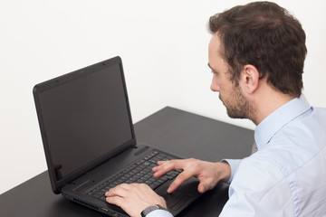 Businessman working on laptop