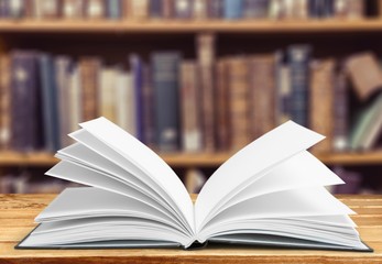 Book. Open book isolated on white and letters flying away