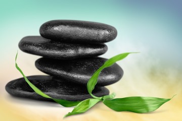 Spa Treatment. Massage Stones with Mint Leaves