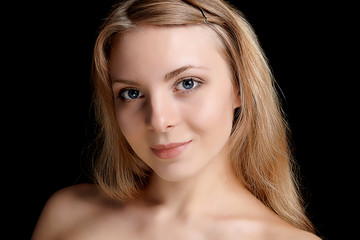 Fototapeta premium blonde woman's beauty portrait, dark background