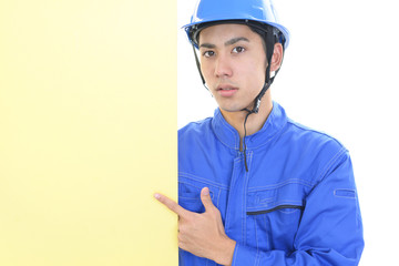 ボードを持つ労働者