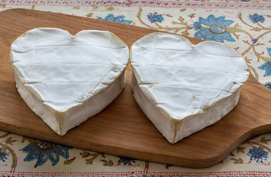 Two cheeses in shape of a heart