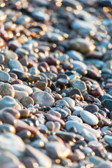 Stones on beach and sea water