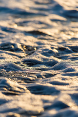 Stones on beach and sea water