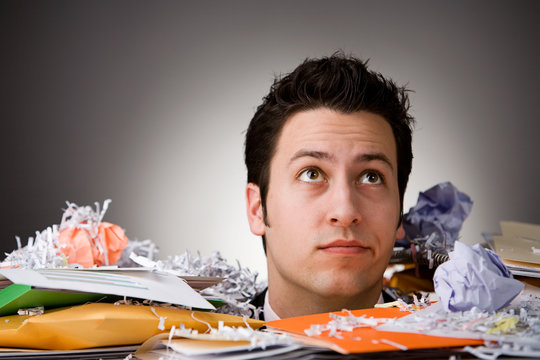 Business: Man Buried In Paperwork Up To Neck