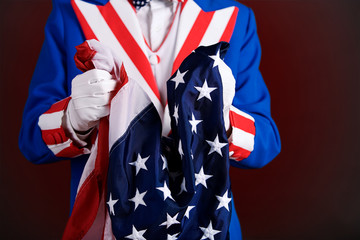 Patriotic: Holding An American Flag