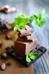 Set of spicy chocolate on wooden table, closeup