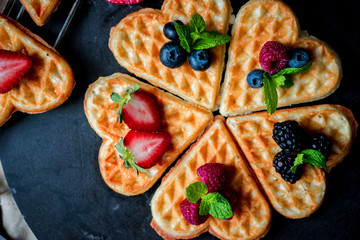 Heart waffles with berries