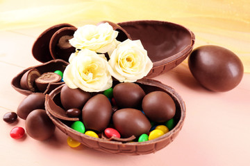Chocolate Easter eggs with flowers, closeup