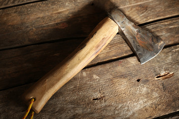 Sharp axe on wooden background