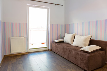 Fototapeta na wymiar Bright baby room with pastel colors wallpaper