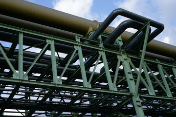 A giant tube of pipework, an exhaust pipe, or oil pipe