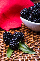 Blackberry on wicker background