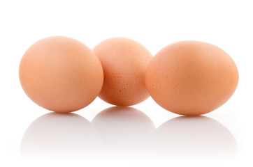 Three eggs isolated on white background