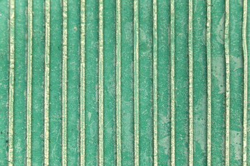 Green rubber surface.