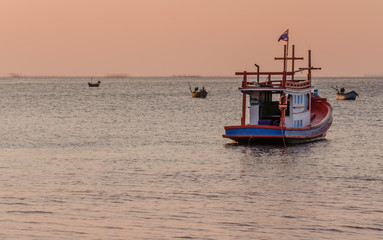 Naklejka na ściany i meble Boat and sea before sunset in eastern Thailand