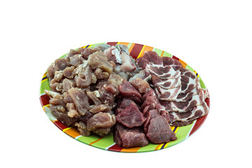 Mixed meat in colorful ceramic plate