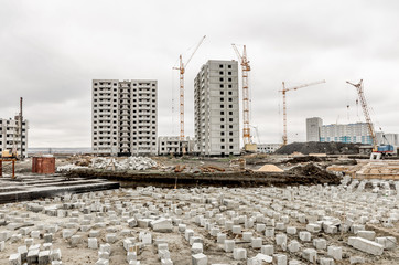 Crane and building construction site