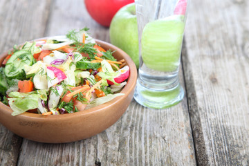 Healthy food for diet on a wooden table .