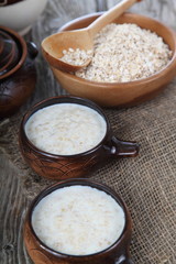 Oatmeal on old wooden table