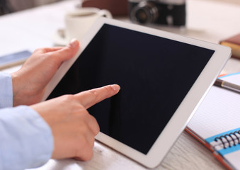 Digital tablet computer with isolated screen in female hands