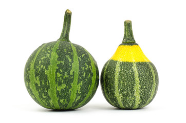 Raw pumpkins on white background