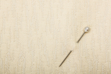 Pin inserted in fabric