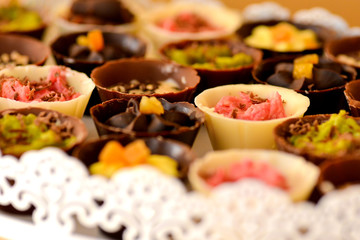 Chocolate cups filled with cream