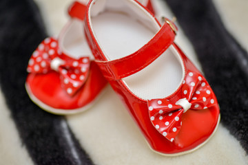 Red shoes baby girl with bow