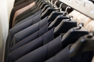 Rows of men's suit jackets