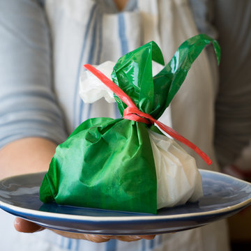 Apulien Burrata Cheese in a Bag Wrapped with a Green Leaf