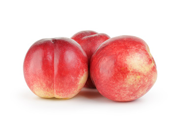 whole nectarine fruits isolated on white