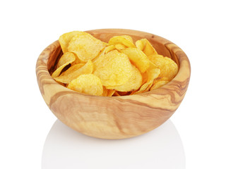 heap of organic potato chips isolated on white