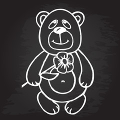 Bear with flower on chalkboard background