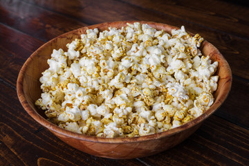 Spiced Popcorn in a Wooden Bowl