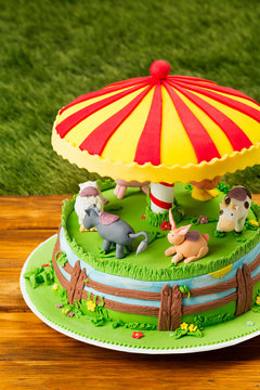 Fondant farm themed cake on picnic table