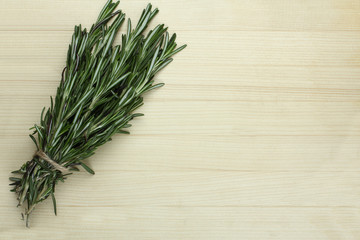 rosemary on a wooden background