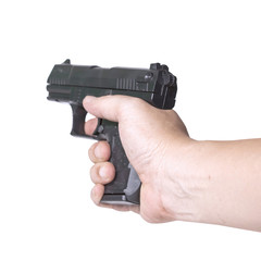 hand holds gun isolated on white background.