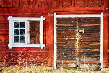 old, antique barn door and windows © christian42