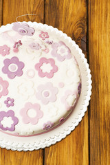 Fondant cake on picnic table