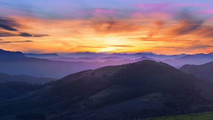 Fototapeta na wymiar mountain silhouettes at sunset