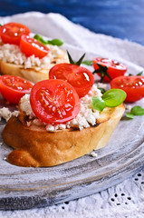 Sandwich with cheese, tomato and Basil