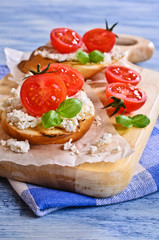 Sandwich with cheese, tomato and Basil