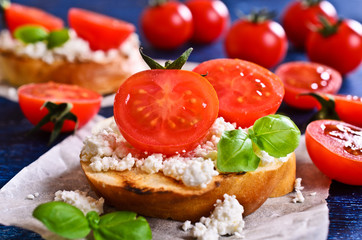 Sandwich with cheese, tomato and Basil