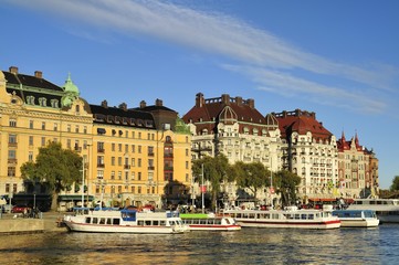 Naklejka na ściany i meble Stockholm embankment with boats