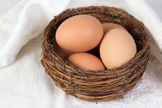Boiled chicken eggs lying in a basket